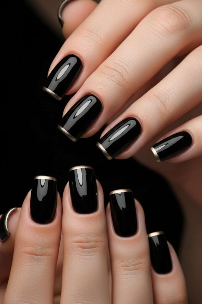 Black Nails with a Barely-There Gold Tip