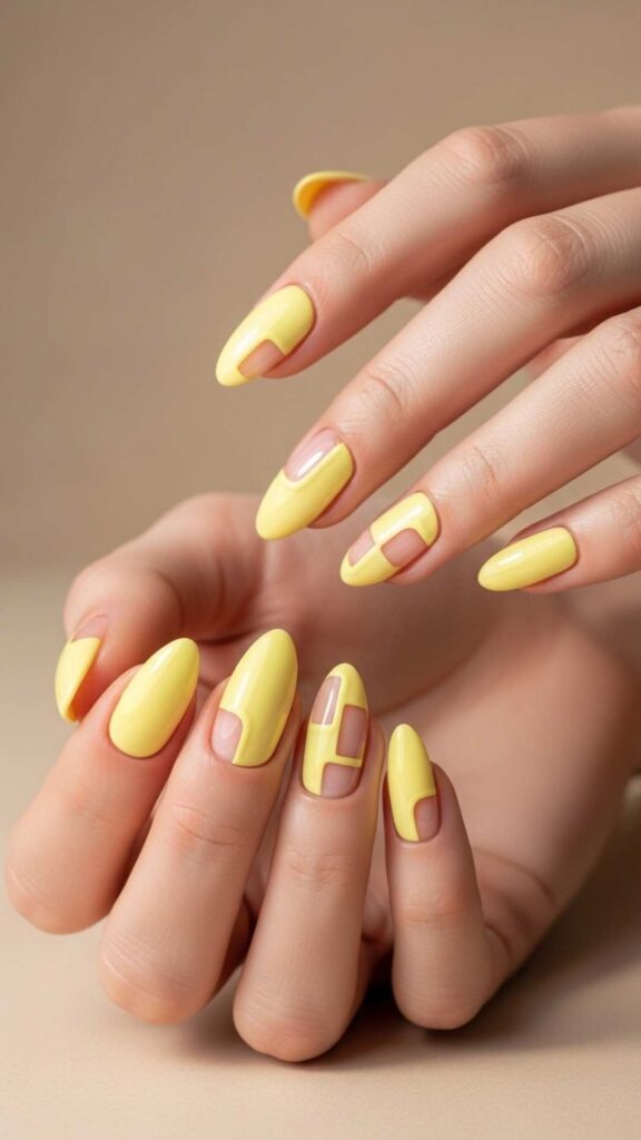 Butter Yellow Almond Nails with Negative Space Details