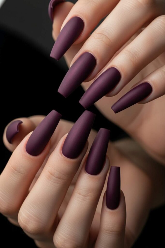 41 Long Acrylic Nail Designs for Baddies That Hit Different in 2026 12 Deep Plum Almond Nails with Satin Finish
