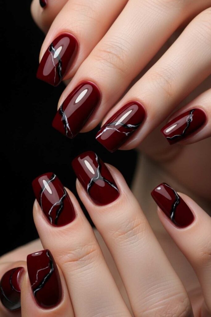 Deep Red Nails with Black Marble Veining