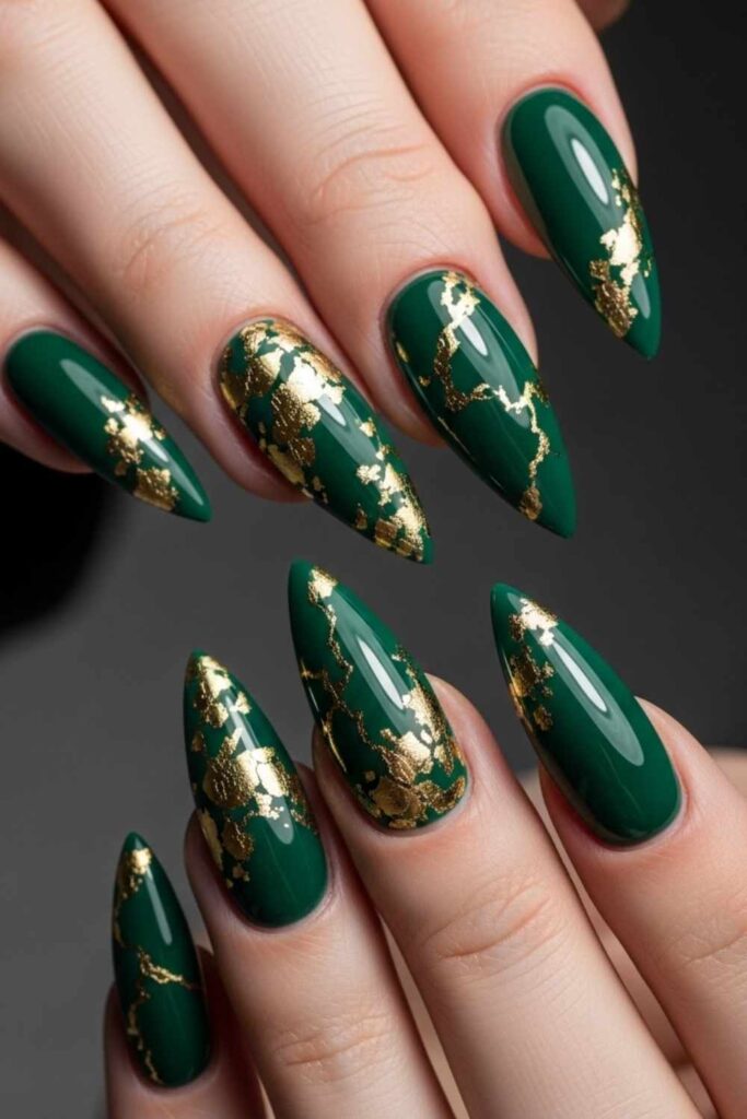 41 Long Acrylic Nail Designs for Baddies That Hit Different in 2026 9 Emerald Green Stiletto Nails with Gold Foil Cracks