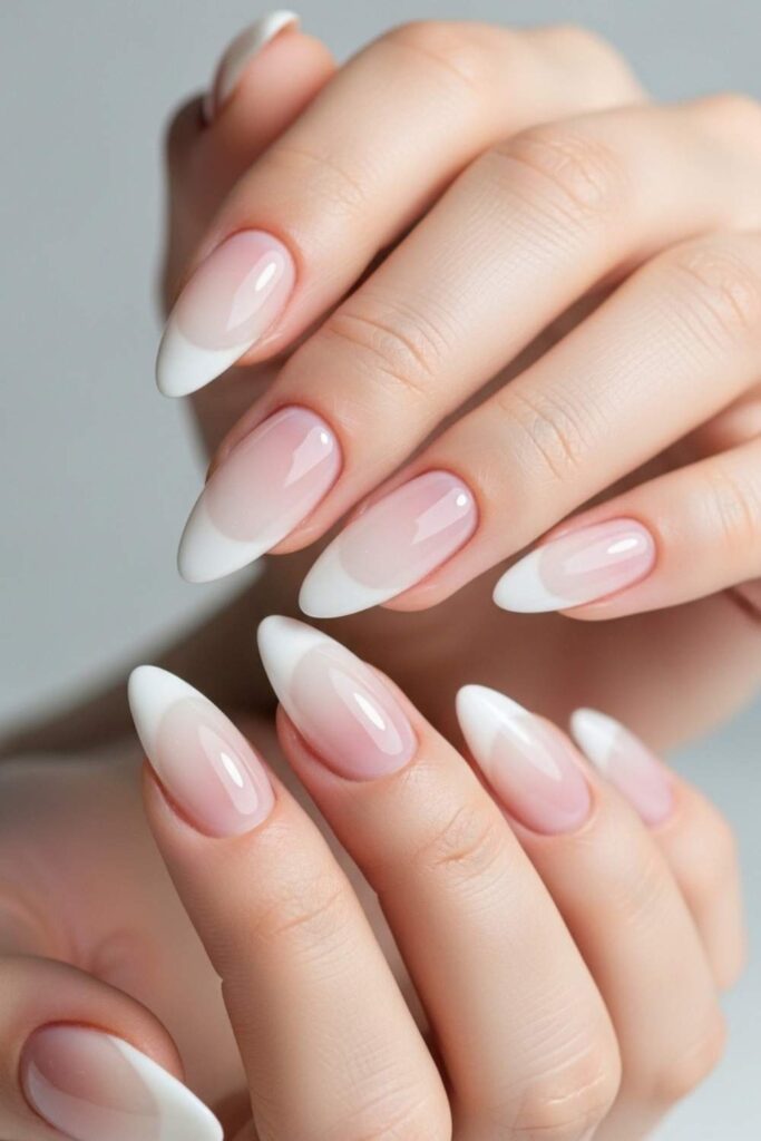 Glazed Milky White Tips on Almond Nails
