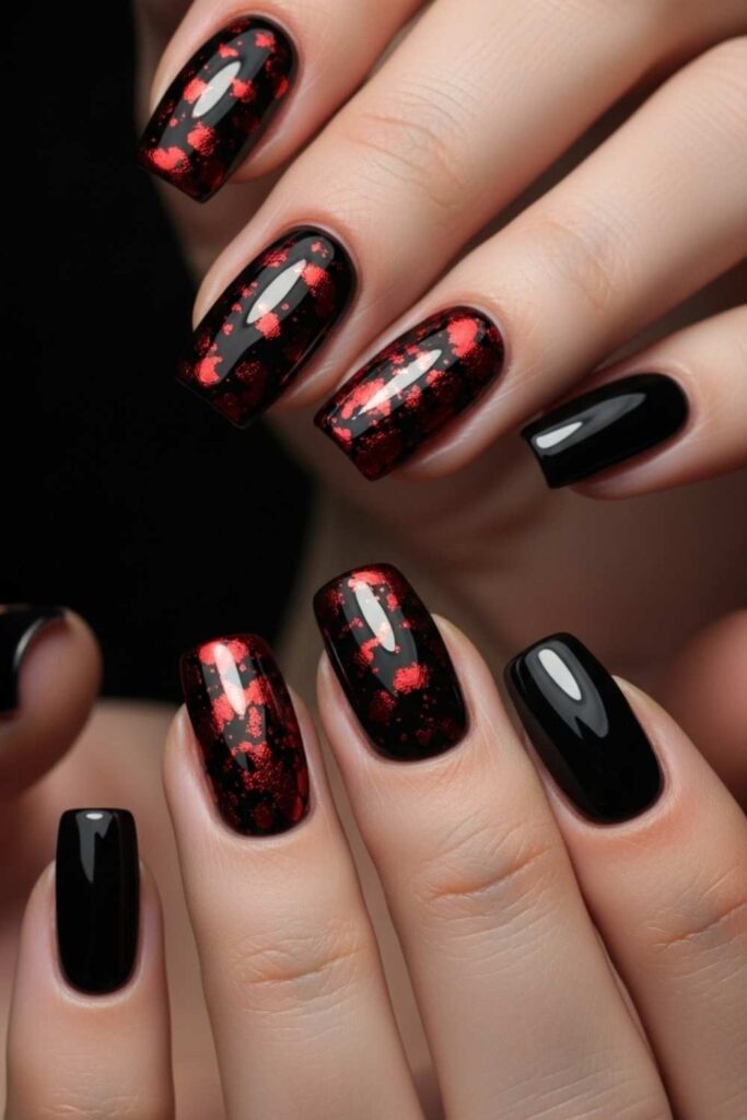 Glossy Black Nails with Red Foil Accents