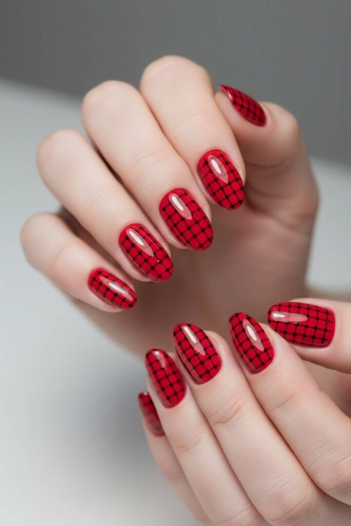 Glossy Red Nails with a Black Dot Grid