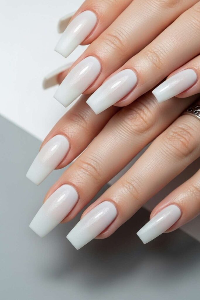 41 Long Acrylic Nail Designs for Baddies That Hit Different in 2026 3 Icy White Square-Tip Acrylics with Frosted Finish