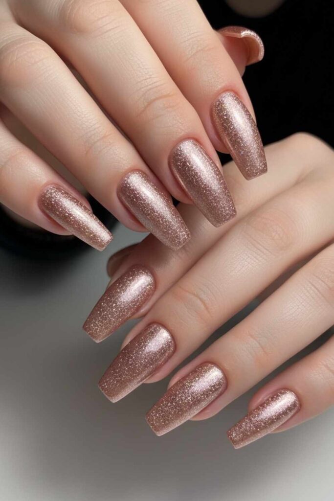 41 Long Acrylic Nail Designs for Baddies That Hit Different in 2026 18 Metallic Rose Gold Coffin Nails with Glitter Fade