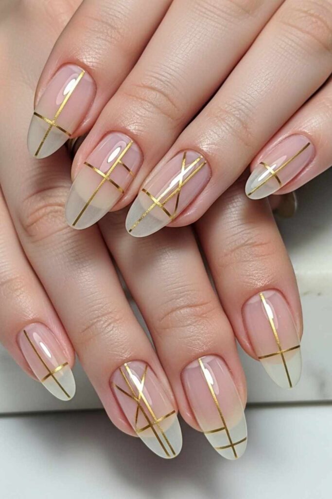 Negative Space Nail Art with Fine Gold Lines