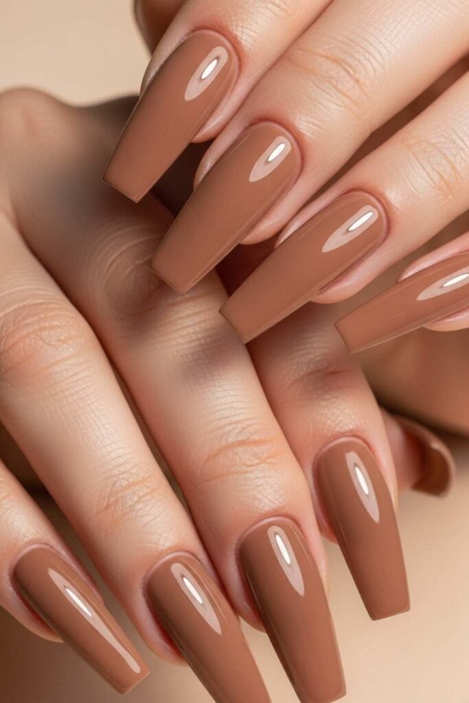 15 Natural Gel Nails Ideas That Look Expensive Without Trying Too Hard 10 Nude Brown Gel on Long Coffin Shape