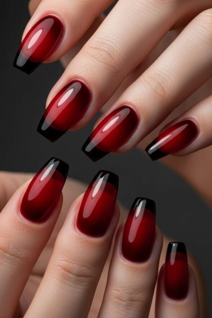 Sheer Red Jelly Nails with Black Base Coat Underneath