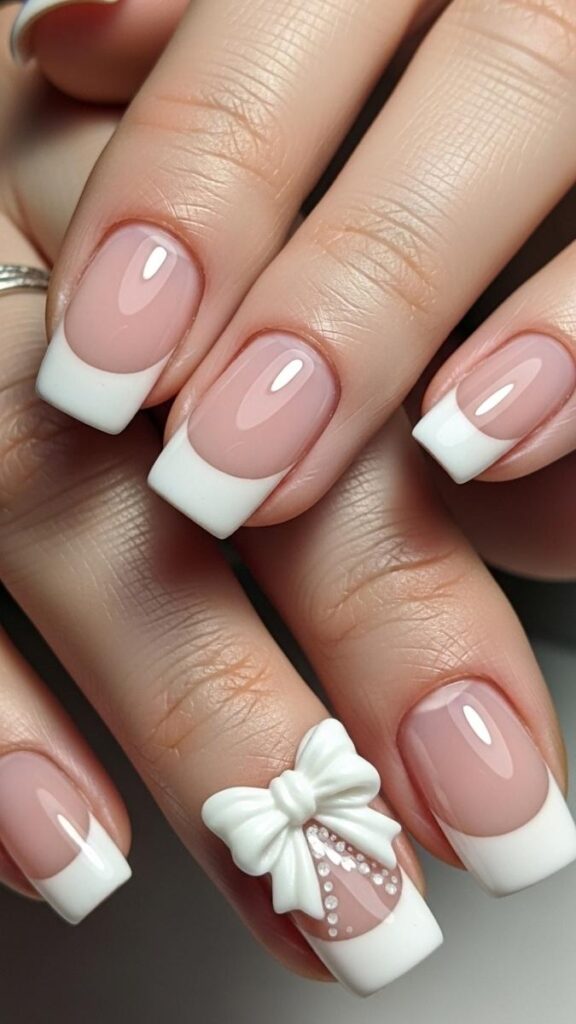 12 White French Tip Nails with Design Ideas That Look Effortlessly Expensive in 2026 25 White French Tip with Bow Detail