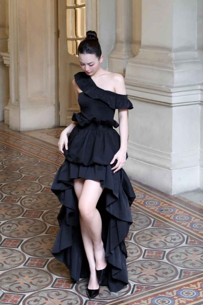 19 Best Birthday Outfit Ideas That Feel Like You, But Make-An-Entrance 15 Asymmetric Hem Dress in Dramatic Black