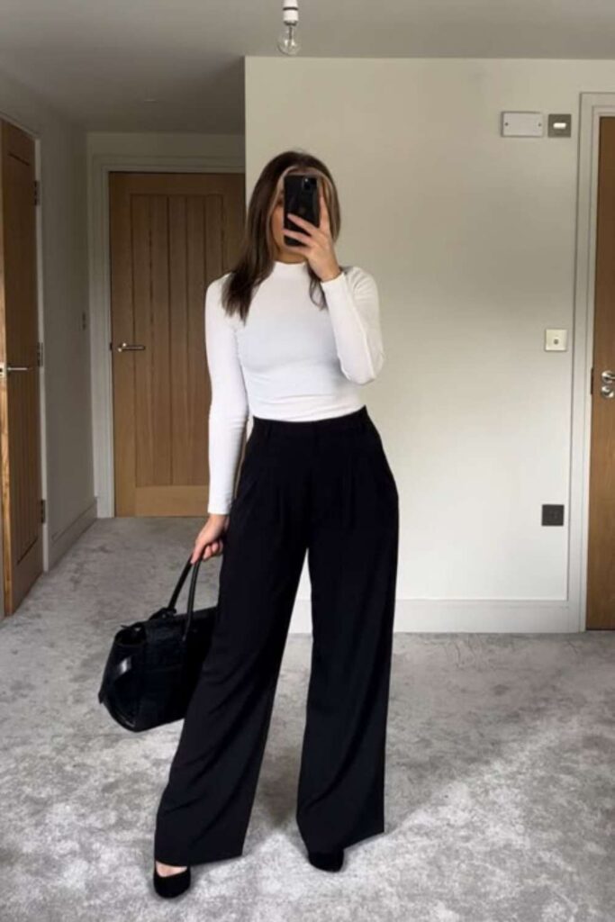 33 Stunning Office Outfits Women That Work From Desk to Dinner 11 Black Turtleneck with Camel Wide-Leg Trousers and White Trainers