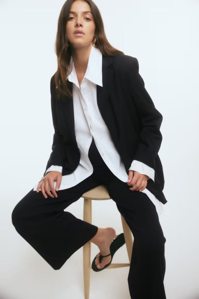 33 Stunning Office Outfits Women That Work From Desk to Dinner 16 Black Wide-Leg Suit with an Oversized White Button-Down and No Tie