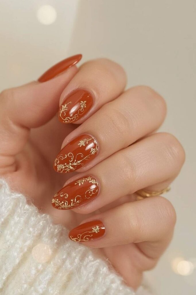 43 Blooming Gel Nail Art Ideas That Look Like They Took Hours (But Didn't) 10 Burnt Orange and Gold Bloom for a Festive Edge