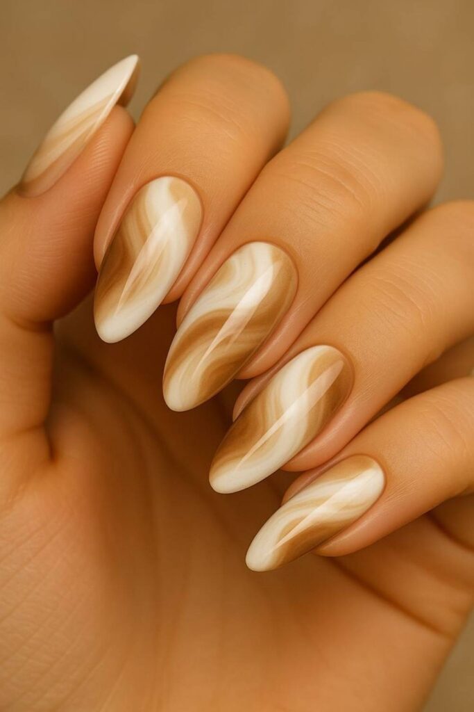 54 Cozy Fall Nails Aesthetic Ideas That Feel Like a Warm Latte in Your Hands 5 Caramel Swirl Nail Art on Nude Base