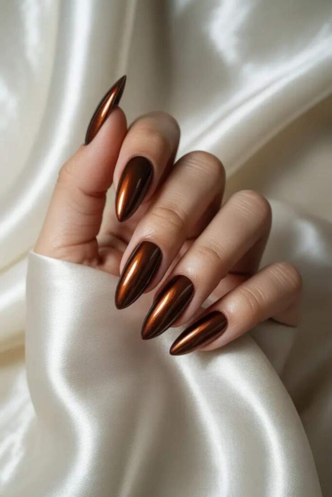 54 Cozy Fall Nails Aesthetic Ideas That Feel Like a Warm Latte in Your Hands 12 Charcoal Gray with Warm Copper Shimmer