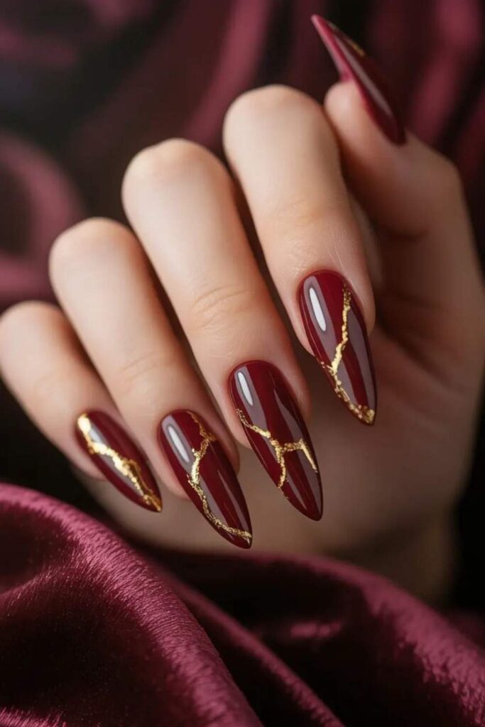 32 Red Acrylic Nail Designs That Always Look Like You Just Left the Salon 6 Cherry Red Nails with Minimalist Gold Line Art