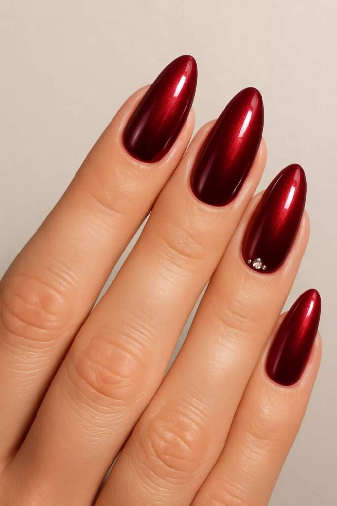 27 Red Acrylic Nails Designs That Look Expensive Without Trying Too Hard (2026) 10 Cherry Red Nails with Pearl Shimmer Topcoat