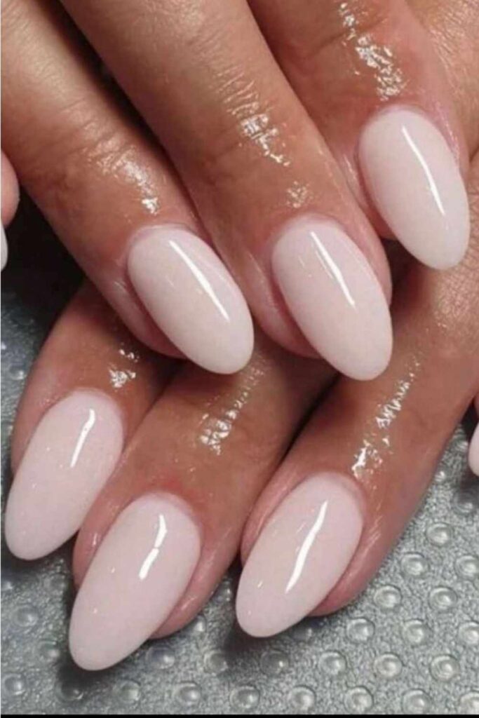 86 Neutral Nail Ideas That Look Expensive Without Even Trying 2 Glazed Almond Nails in Sheer Milk Pink
