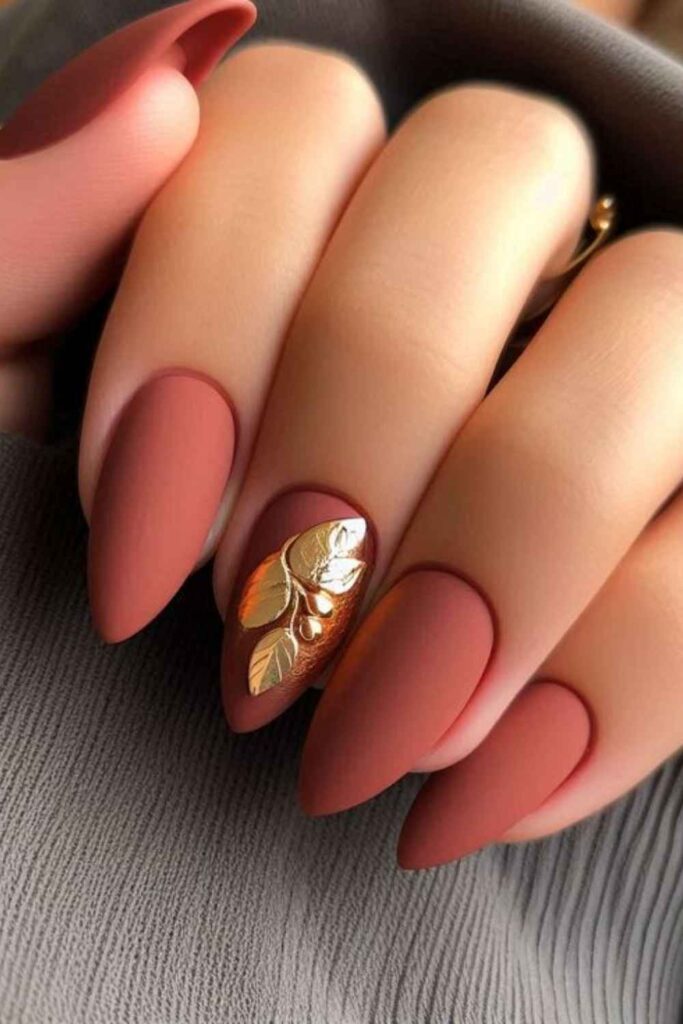 44 Cute Back to School Nails That'll Make You Actually Excited for September 12 Glazed Terracotta with Gold Foil Fragments