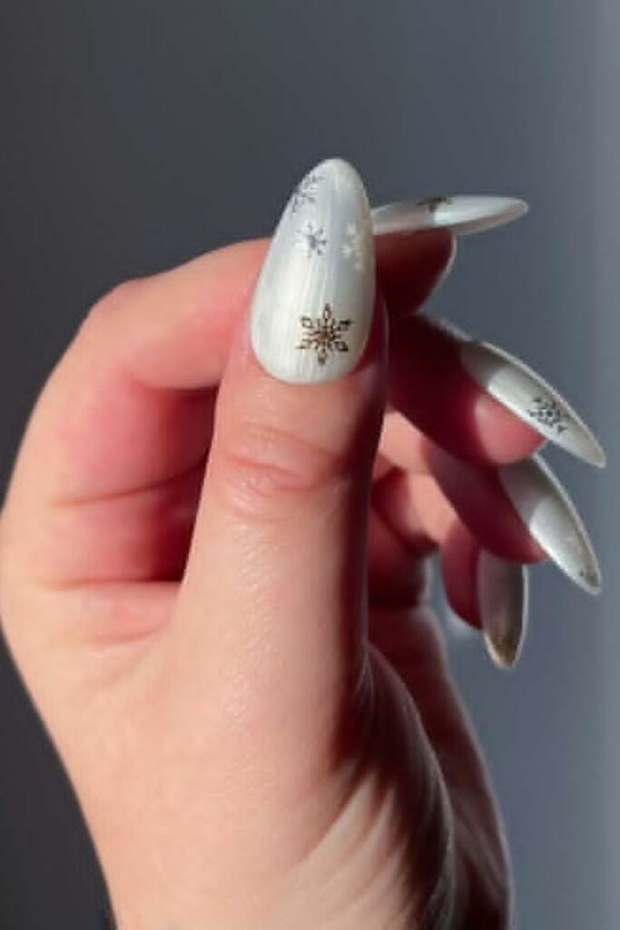 67 Nail Art Tutorial Ideas That Are Actually Worth Saving in 2026 14 Ice White with 3D Snowflake Nail Stickers