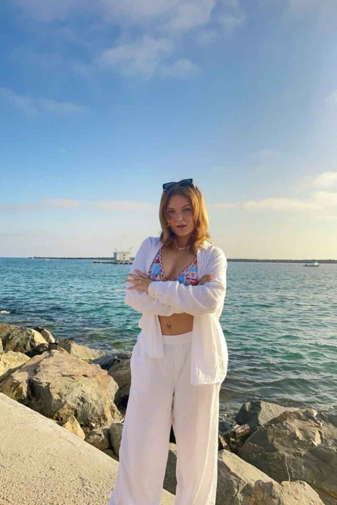 Linen Shirt Unbuttoned Over a Bikini Top with Wide-Leg Pants