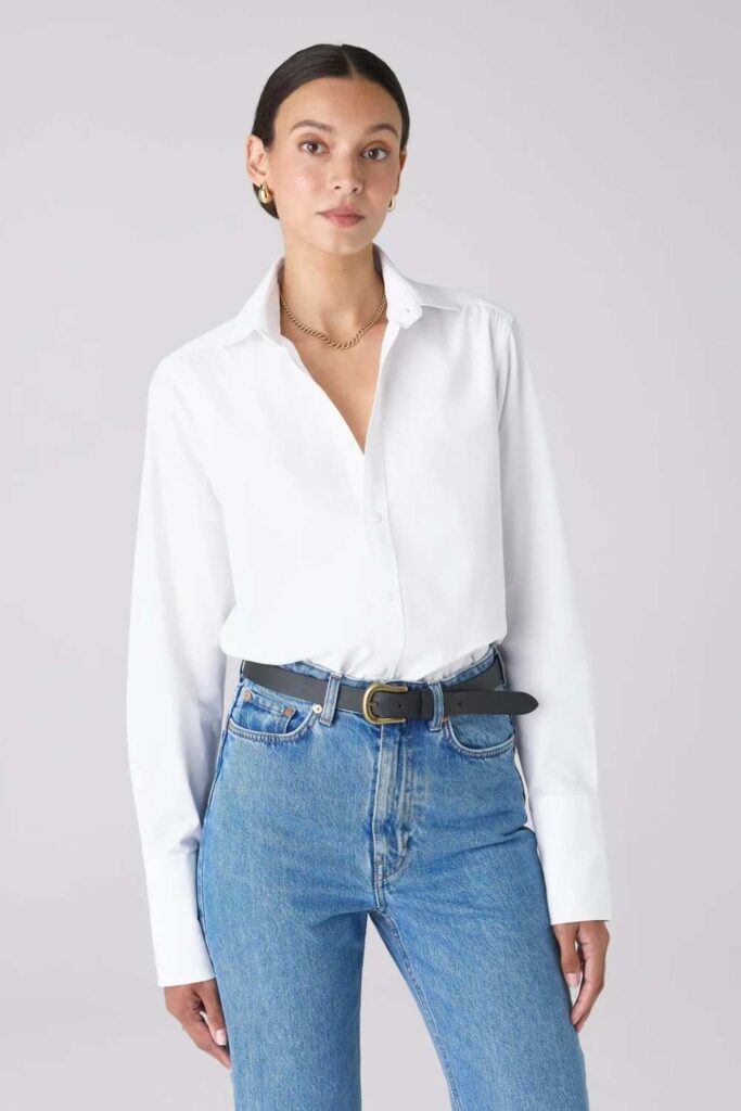 33 Stunning Office Outfits Women That Work From Desk to Dinner 9 Longline Black Waistcoat Over a White Poplin Shirt with Straight-Leg Denim