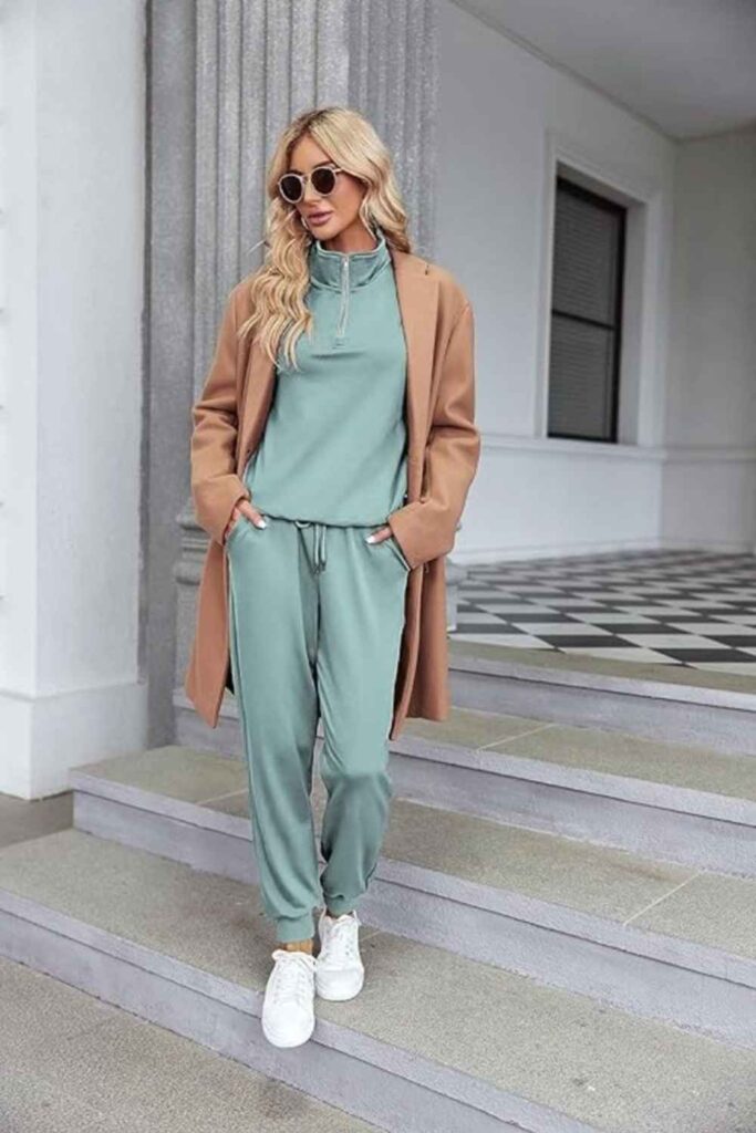 17 Street Style Outfits Casual Enough for Everyday But Cool Enough to Turn Heads 12 Matching Tracksuit in Muted Sage with Retro Sneakers