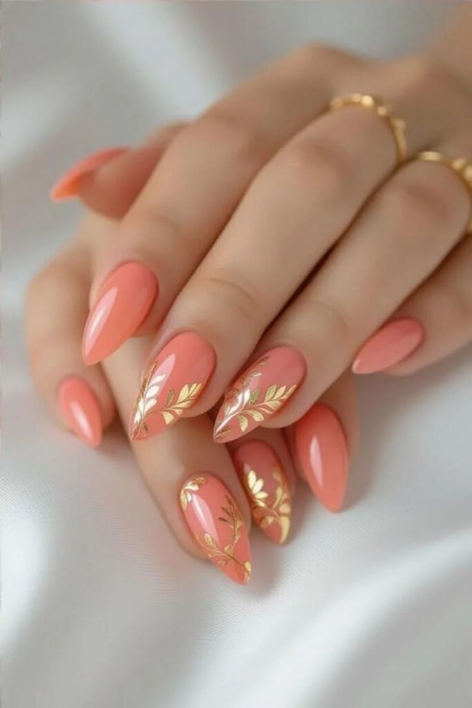 39 Quick Nail Designs Easy Enough to Do at Home (That Actually Look Salon-Done) 6 Peachy Coral with Gold Foil Flecks