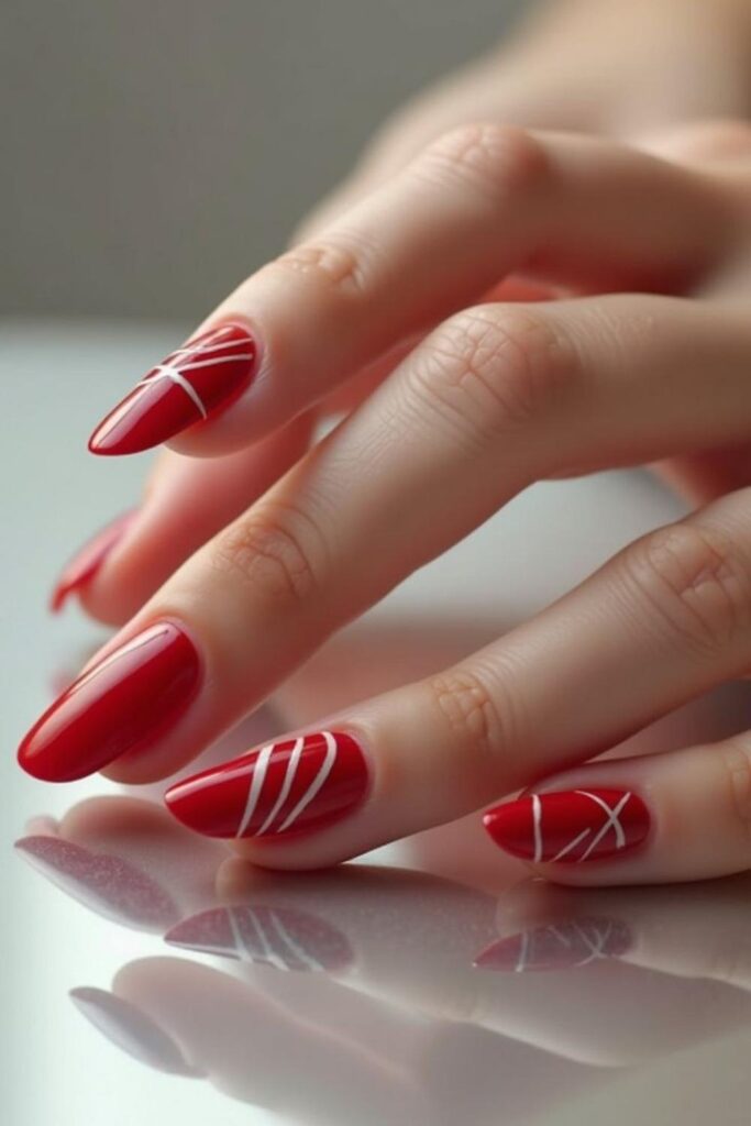32 Red Acrylic Nail Designs That Always Look Like You Just Left the Salon 5 Red Acrylic Nails with White Negative Space Lines