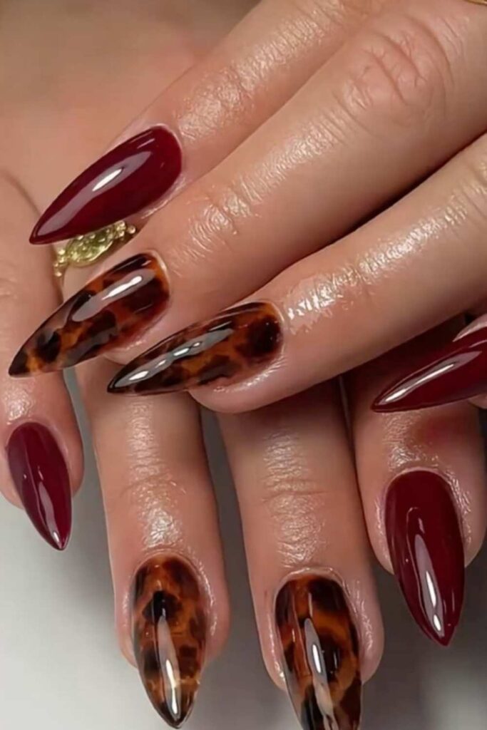 32 Red Acrylic Nail Designs That Always Look Like You Just Left the Salon 7 Red Tortoiseshell Pattern on Long Coffin Acrylics