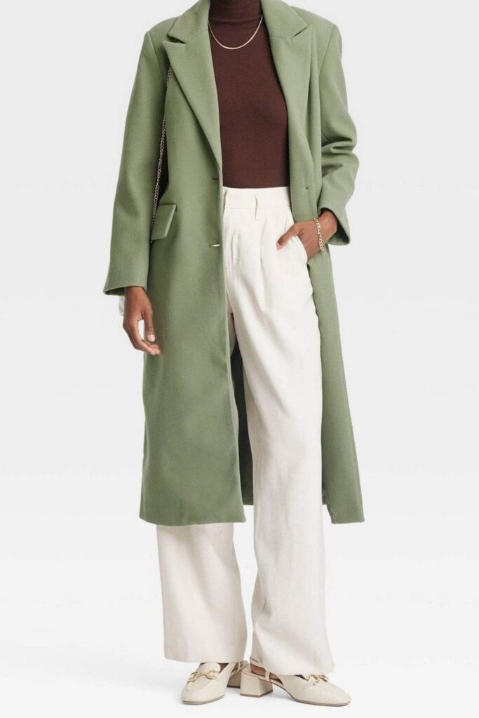 Sage Green Trench Coat Over an All-White Base