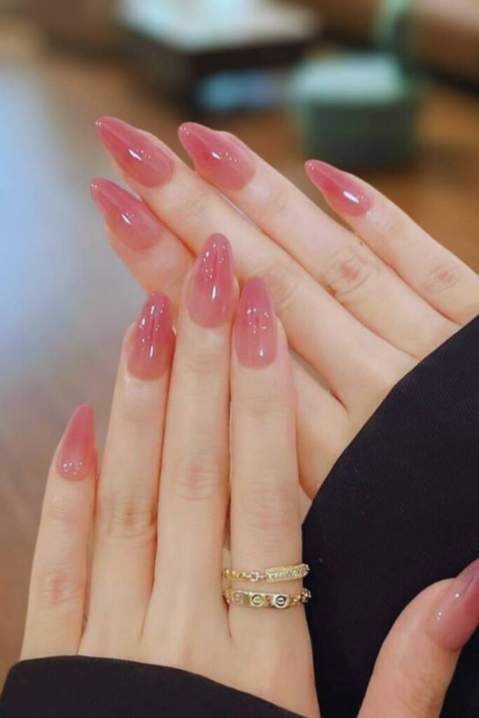 Sheer Coral Jelly Nails with a Glossy Finish