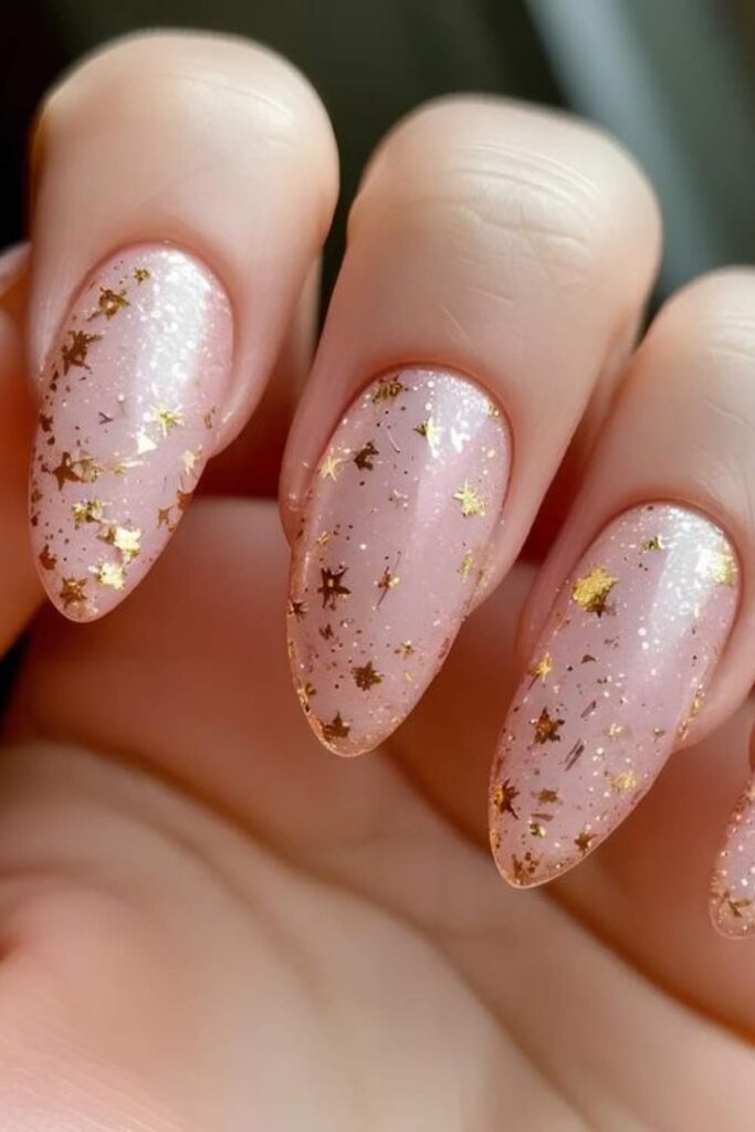 44 Cute Back to School Nails That'll Make You Actually Excited for September 2 Sheer Milky Pink with Tiny Gold Stars