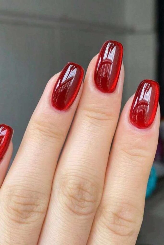 27 Red Acrylic Nails Designs That Look Expensive Without Trying Too Hard (2026) 4 Sheer Red Jelly Nails with a Subtle Glitter Base