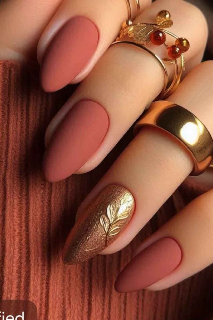 43 Blooming Gel Nail Art Ideas That Look Like They Took Hours (But Didn't) 3 Terracotta and Rust Bloom on a Warm Beige Base