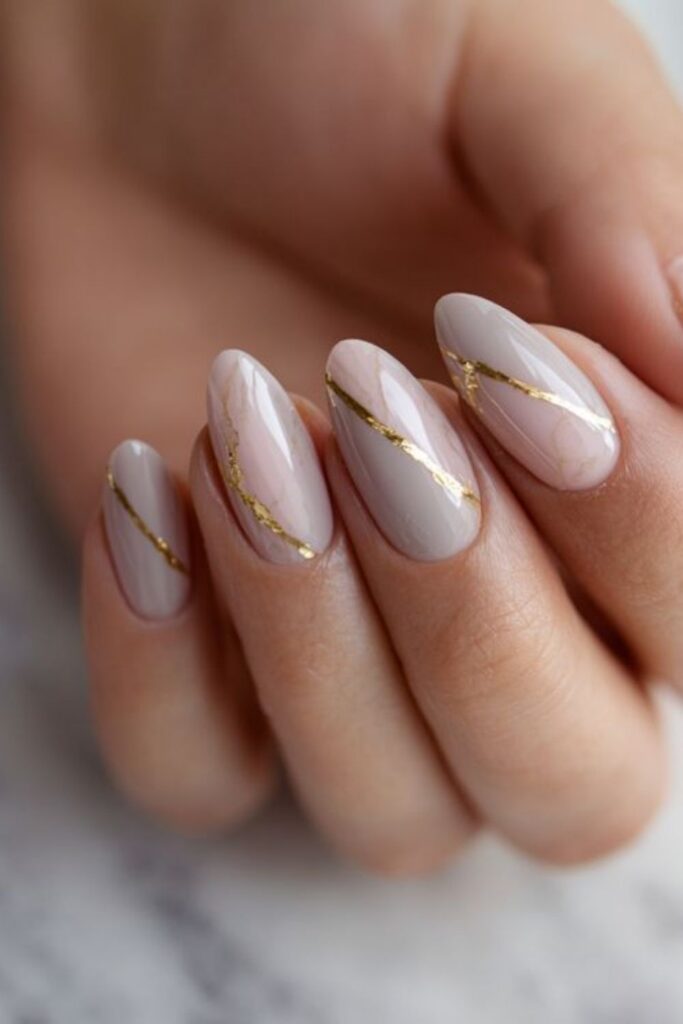 10 Simple Nail Designs for Beginners That Actually Look Expensive 10 Thin Diagonal Tape Line in Metallic Gold