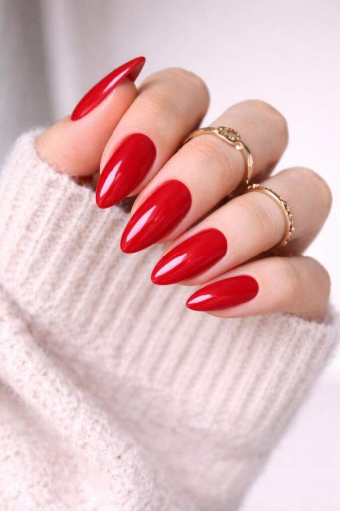 29 Summer Nail Ideas That Look Expensive Without Trying Too Hard 4 Tomato Red Oval Nails with a High-Gloss Finish