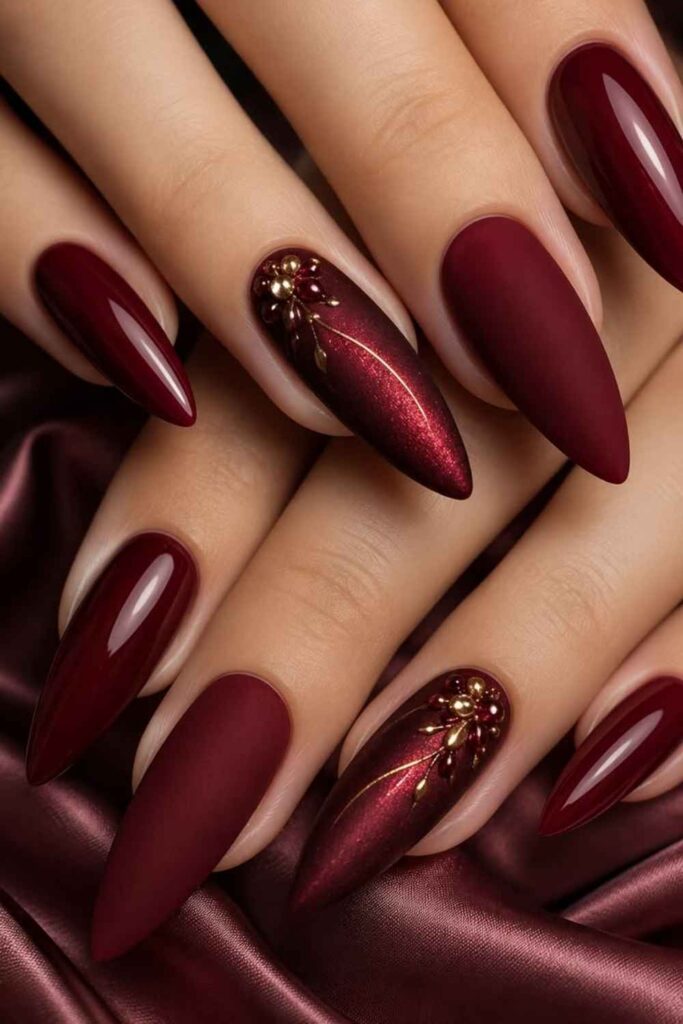 27 Red Acrylic Nails Designs That Look Expensive Without Trying Too Hard (2026) 5 Velvet Red Nails with Tonal Floral Texture