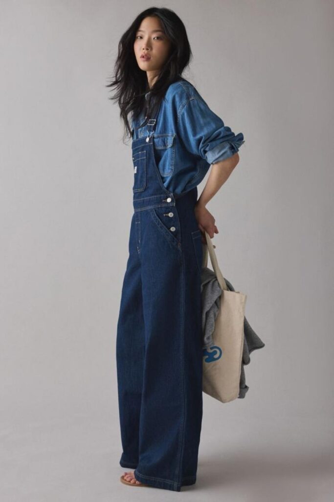 27 Casual Everyday Outfits That Always Look Effortlessly Put-Together 15 Vintage-Wash Denim Overalls with a Striped Long-Sleeve Underneath