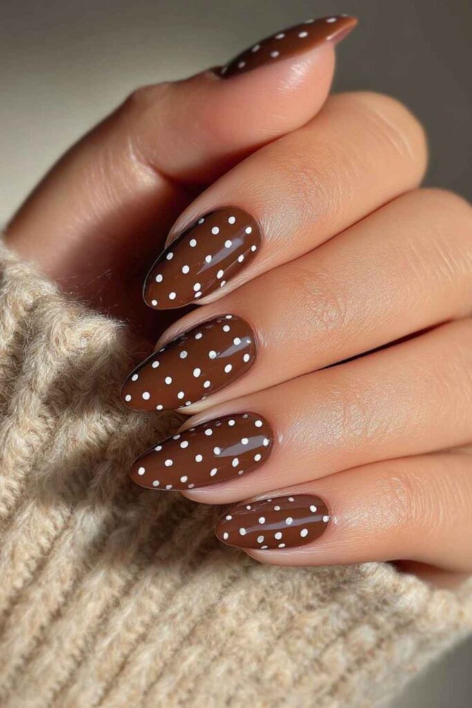 54 Cozy Fall Nails Aesthetic Ideas That Feel Like a Warm Latte in Your Hands 16 Warm Sand with Tiny Brown Polka Dots
