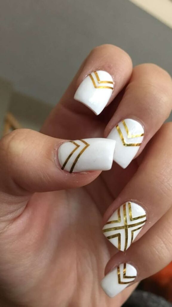 White Nails with Gold Negative Space Lines